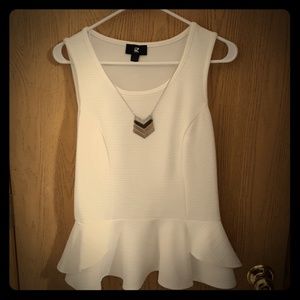 White Peplum Sleeveless Shirt